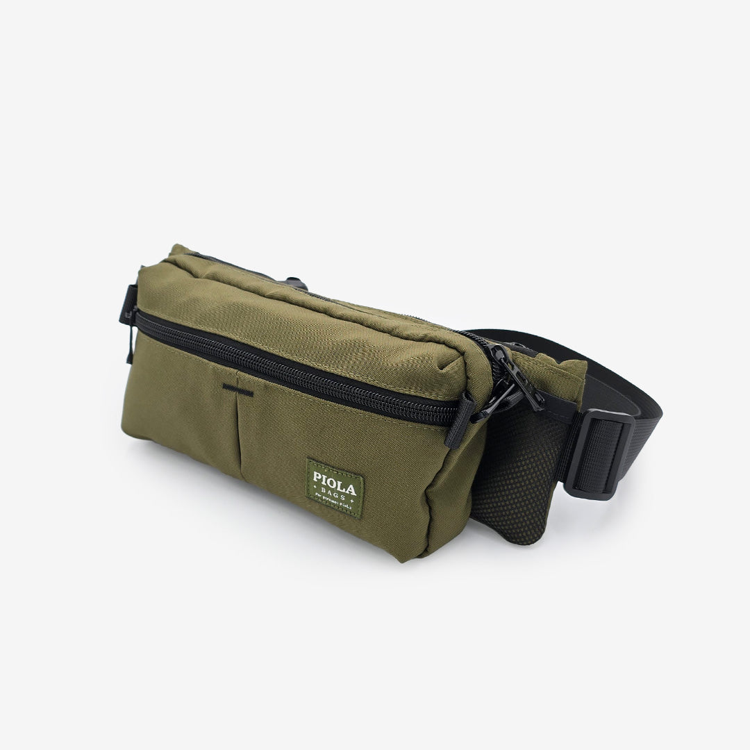 canguro larco en verde cerrado, diseño urbano y práctico, producto local y fair trade hecho por Piola Bags.