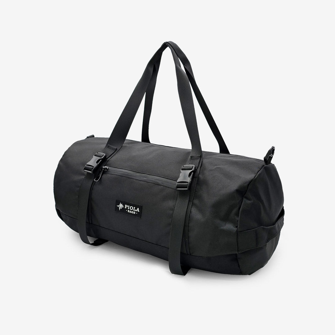 Maletín Sprint negro con asas ajustables, ideal para rutinas urbanas y viajes cortos. Diseño peruano elaborado como producto local por Piola Bags.
