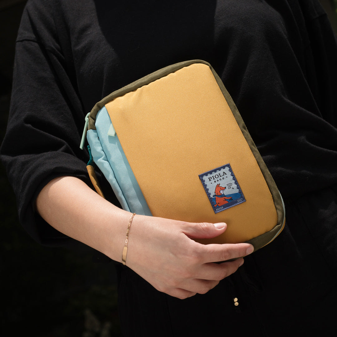 Tech Pack Mostaza-Celeste